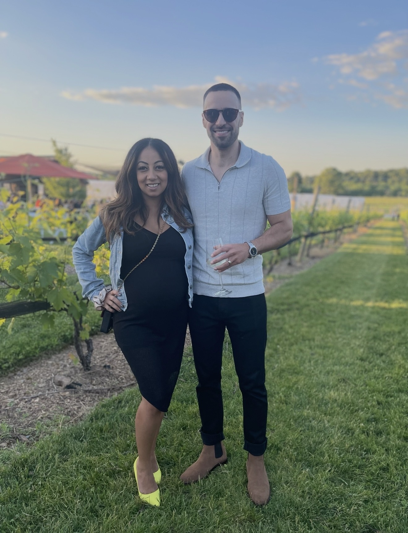 Merna and Dom Cirillo together among grapevines